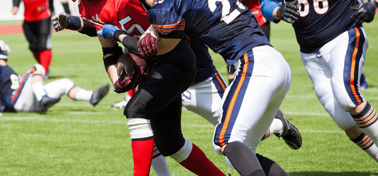 closeup shot of an american football game in action